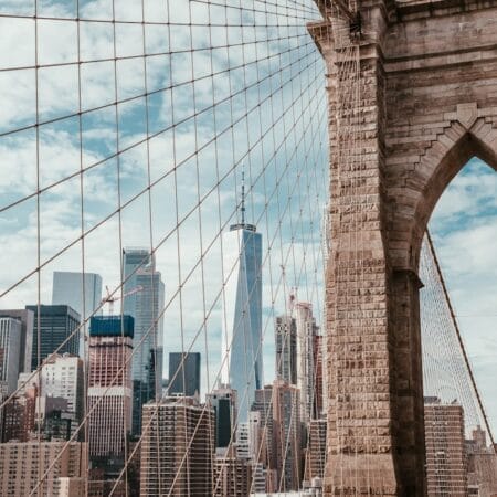 Brooklyn Bridge under cloudy sky